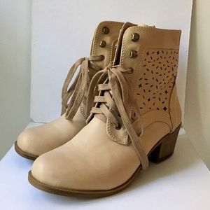 Perforated cream lace up boots